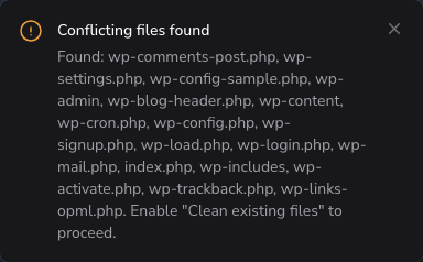 The Conflicting files found warning naming the files that blocked the installation